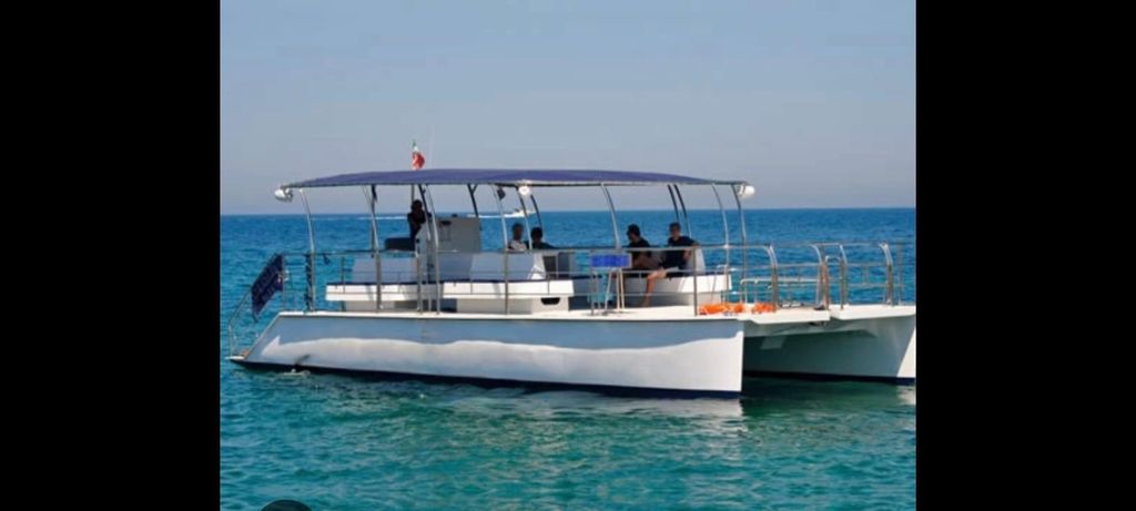 Castellammare del Golfo: Katamaran-Tour bei Sonnenuntergang mit Aperitif