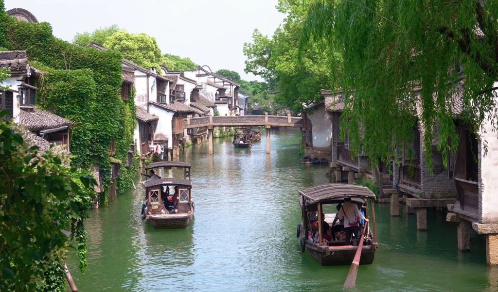 Hangzhou: Wuzhen & Nanxun Stadtrundfahrt mit Tee & Pingtan